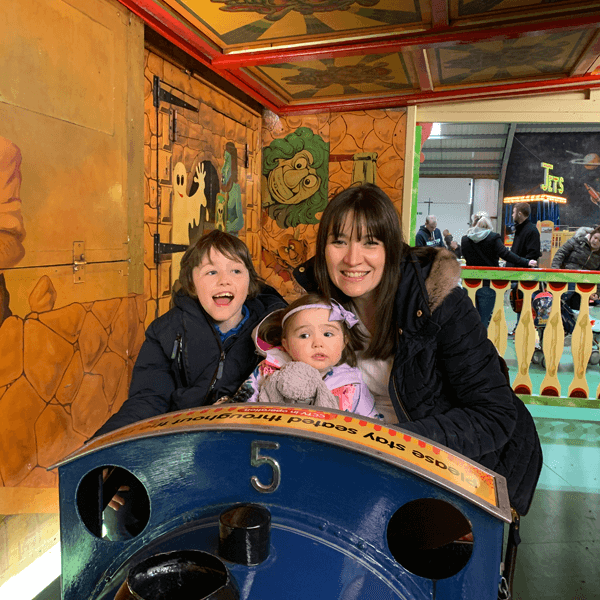 Image of a family on a ghost train ride