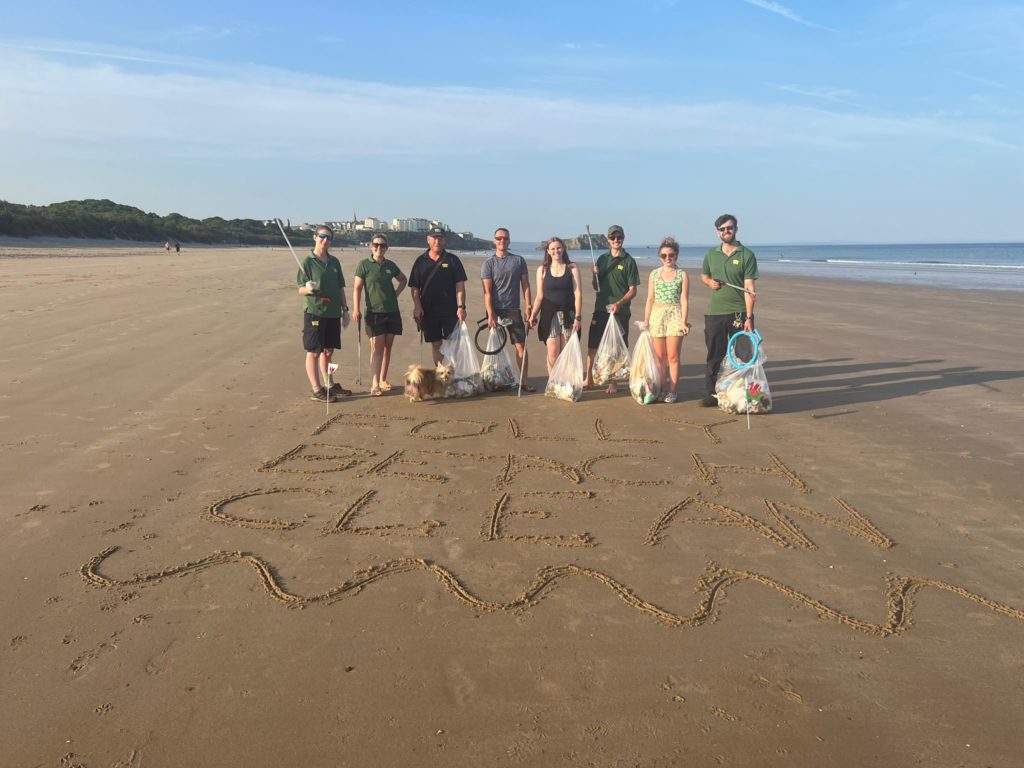 Folly Farm staff on a beach clean